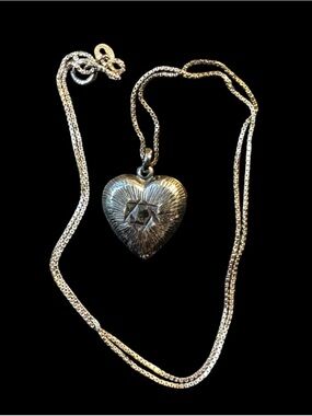 Vintage sterling silver Star of David carved puffy heart pendant
